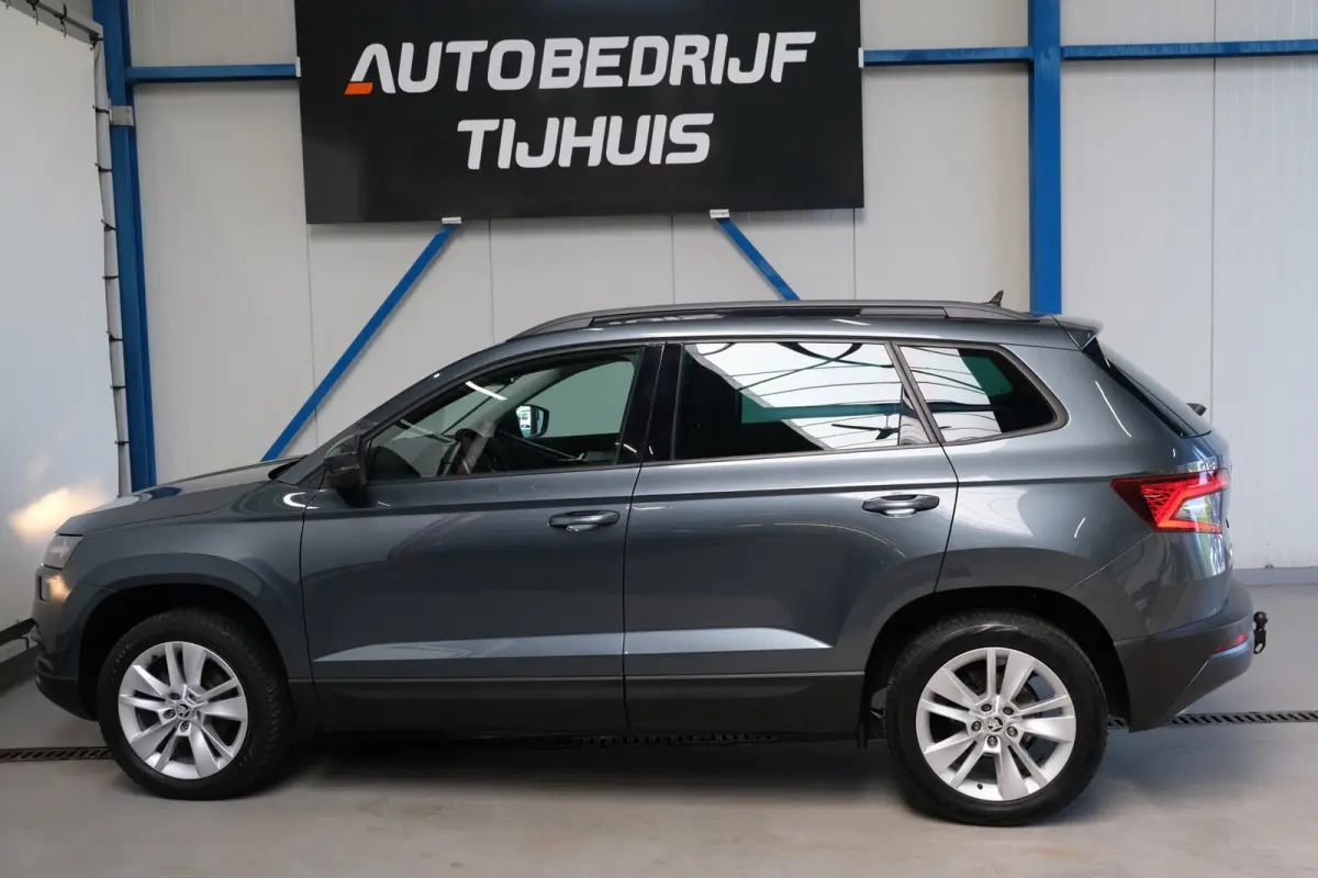 1.0 TSI Style - Airco, Cruise, Navi, PDC, Carplay, Trekhaak.