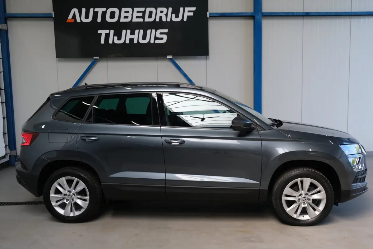 1.0 TSI Style - Airco, Cruise, Navi, PDC, Carplay, Trekhaak.