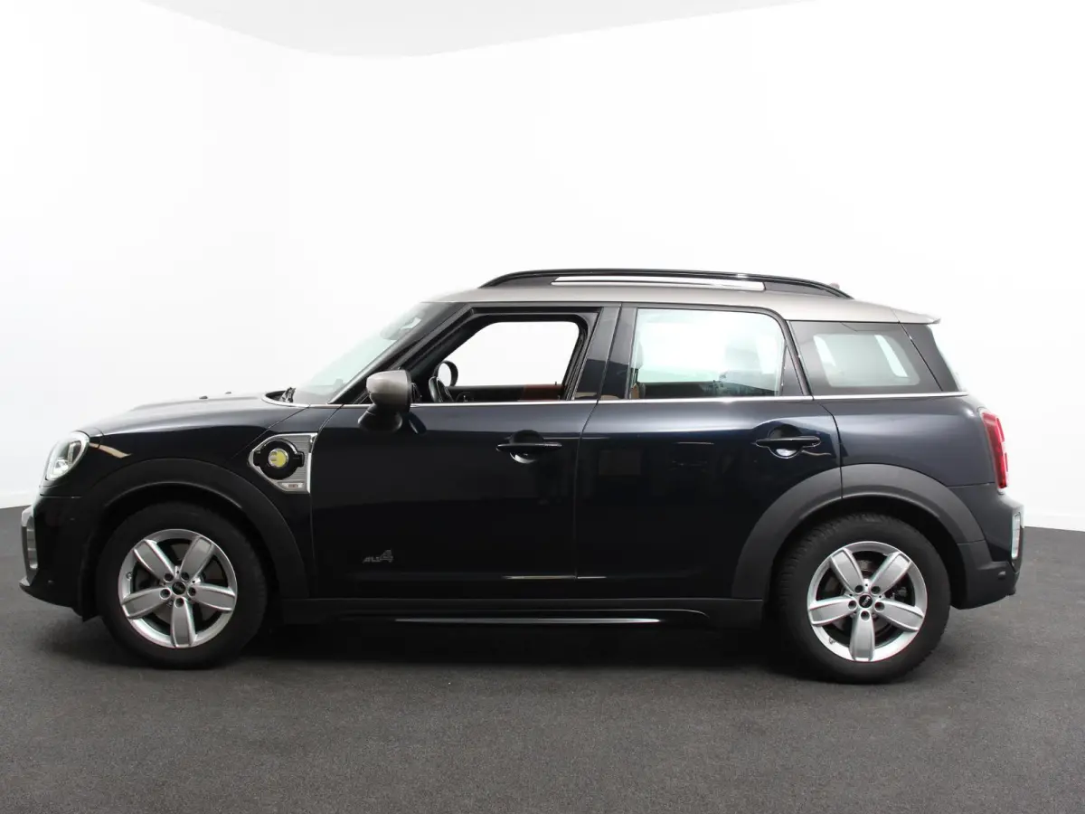 1.5 Cooper PHEV ALL4 Chili Automaat Climate control Adaptieve cruise control HUD Lichtmetalen velgen Navigatie Parkeersensoren Camera Stoelverwarming