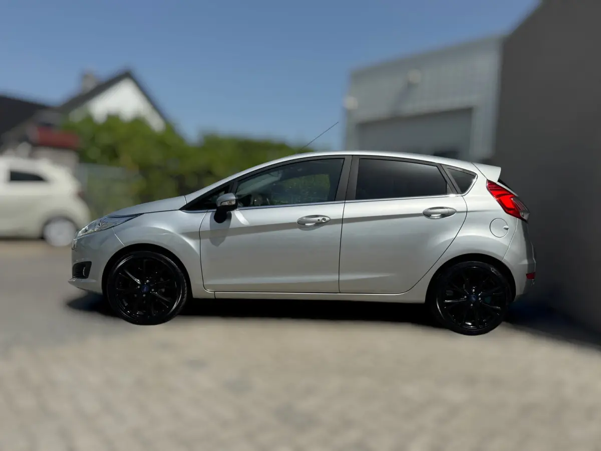1.0 EcoBoost Titanium 1E EIGENAAR / KEYLESS GO / PDC / NAVI / CRUISE CONTROL / ZWARTE LMV /