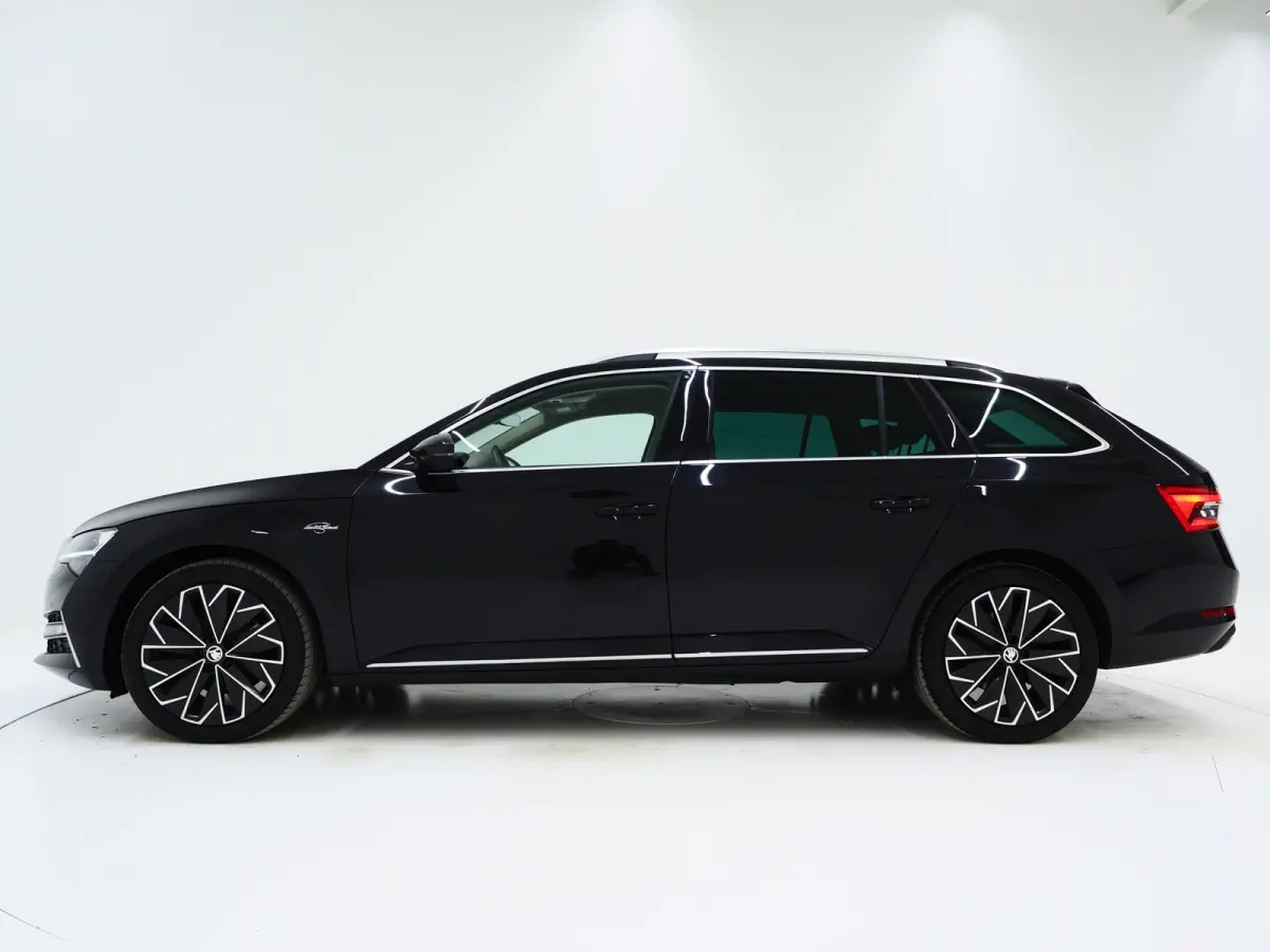 1.4 TSI iV Laurin & Klement | Leder | Trekhaak | Canton | Adaptive Cruise | Keyless | Sfeerlicht | Memory | Carplay