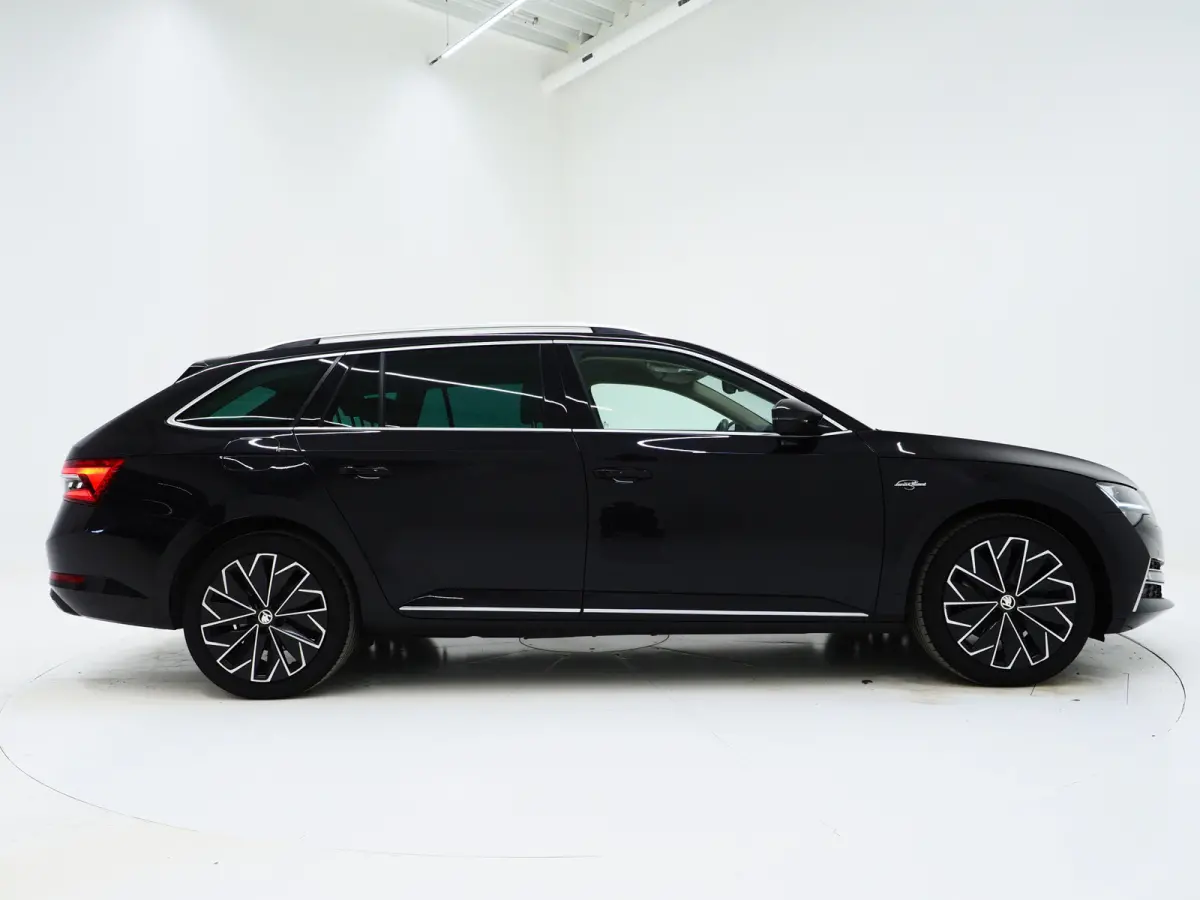 1.4 TSI iV Laurin & Klement | Leder | Trekhaak | Canton | Adaptive Cruise | Keyless | Sfeerlicht | Memory | Carplay
