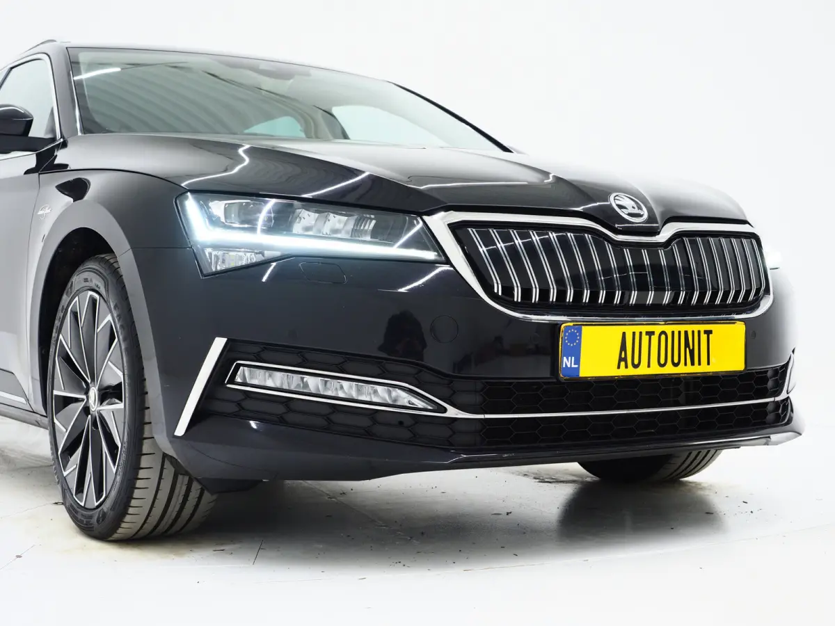 1.4 TSI iV Laurin & Klement | Leder | Trekhaak | Canton | Adaptive Cruise | Keyless | Sfeerlicht | Memory | Carplay