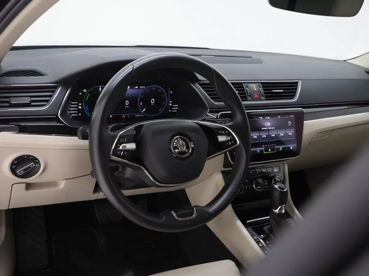 1.4 TSI iV Laurin & Klement | Leder | Trekhaak | Canton | Adaptive Cruise | Keyless | Sfeerlicht | Memory | Carplay