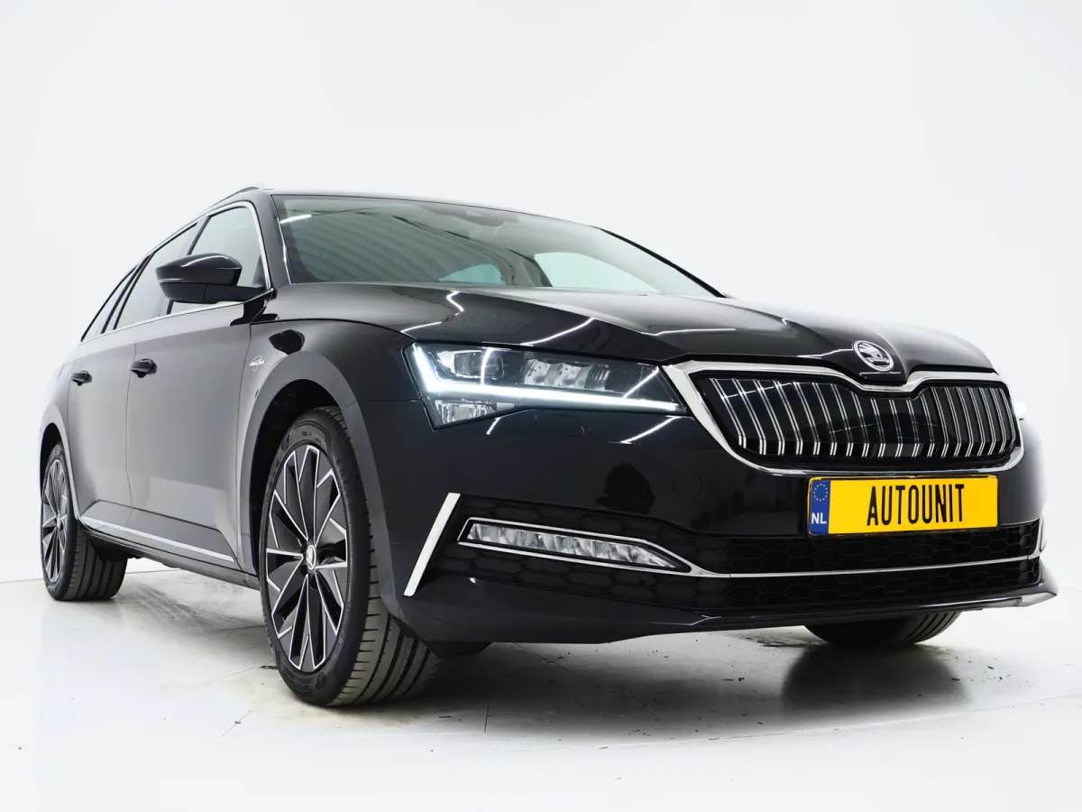 1.4 TSI iV Laurin & Klement | Leder | Trekhaak | Canton | Adaptive Cruise | Keyless | Sfeerlicht | Memory | Carplay