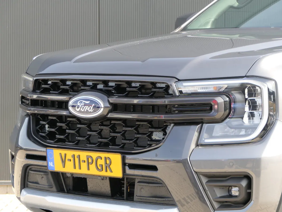 Wildtrak 2.3 PHEV | Power Rollertop | Navigatie | Stoelverwarming | Trekhaak | Camera | CarPlay/Android Auto