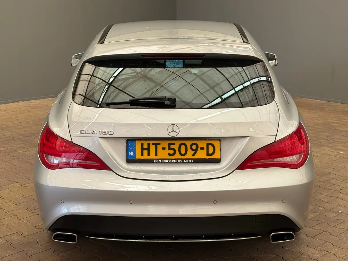 180 OrangeArt Edition Leder/Stof Sportstoelen | Stoelverwarming | Parkeersensoren Rondom | Airco | Cruise | 17" Lichtmetaal | 360° Parkeersensoren | AMG-styling | Airco