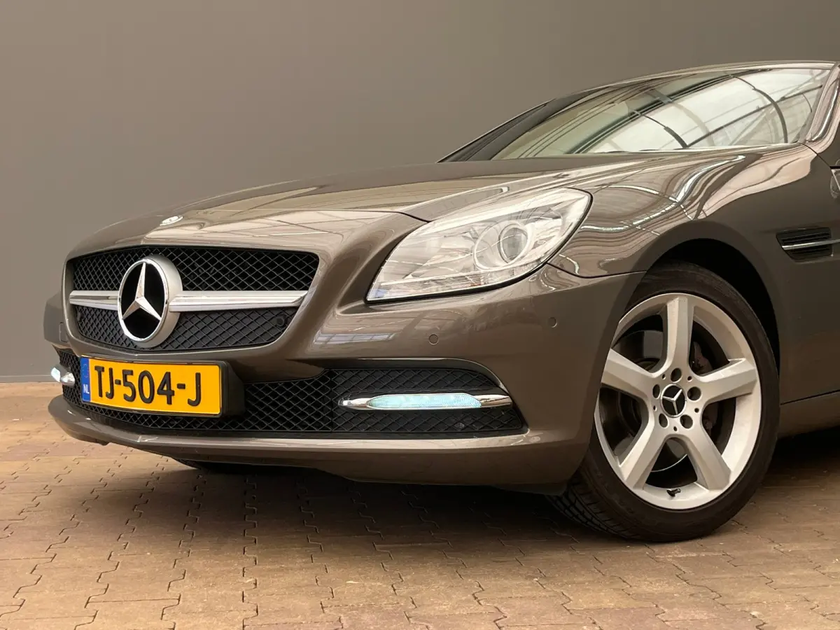 250 Lederen Bekleding | Airscarf | Stoelverwarming | 18" Lichtmetaal | Navigatie | Cruise | Airco | Airco | Audio-navigatie full map | Cruise control