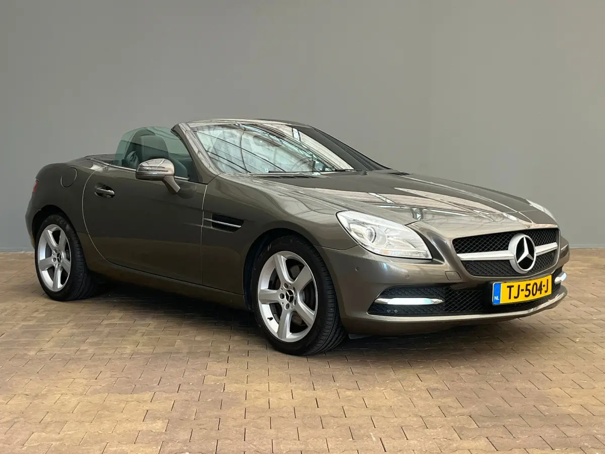 250 Lederen Bekleding | Airscarf | Stoelverwarming | 18" Lichtmetaal | Navigatie | Cruise | Airco | Airco | Audio-navigatie full map | Cruise control