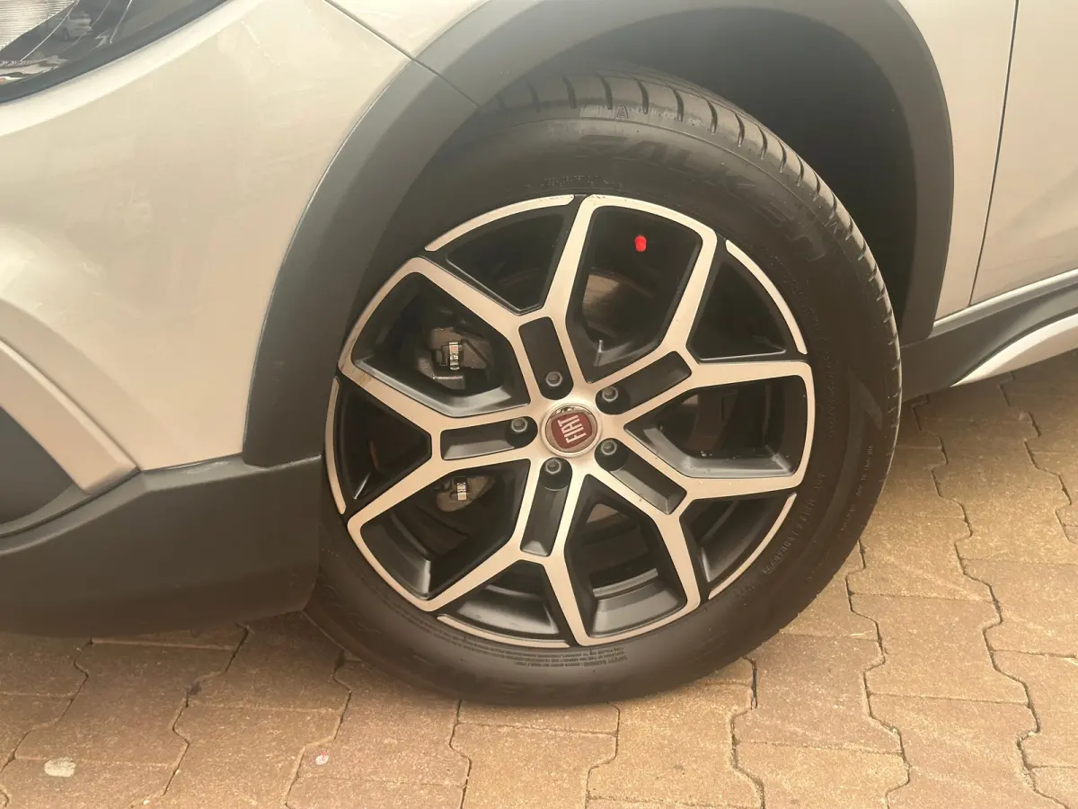 1.0 Cross Camera | Keyless | Navigatie | 17" Lichtmetaal | Climate | Adpatieve Cruise | Carplay | Achteruitrijcamera | Airco (automatisch) | Armsteun voor