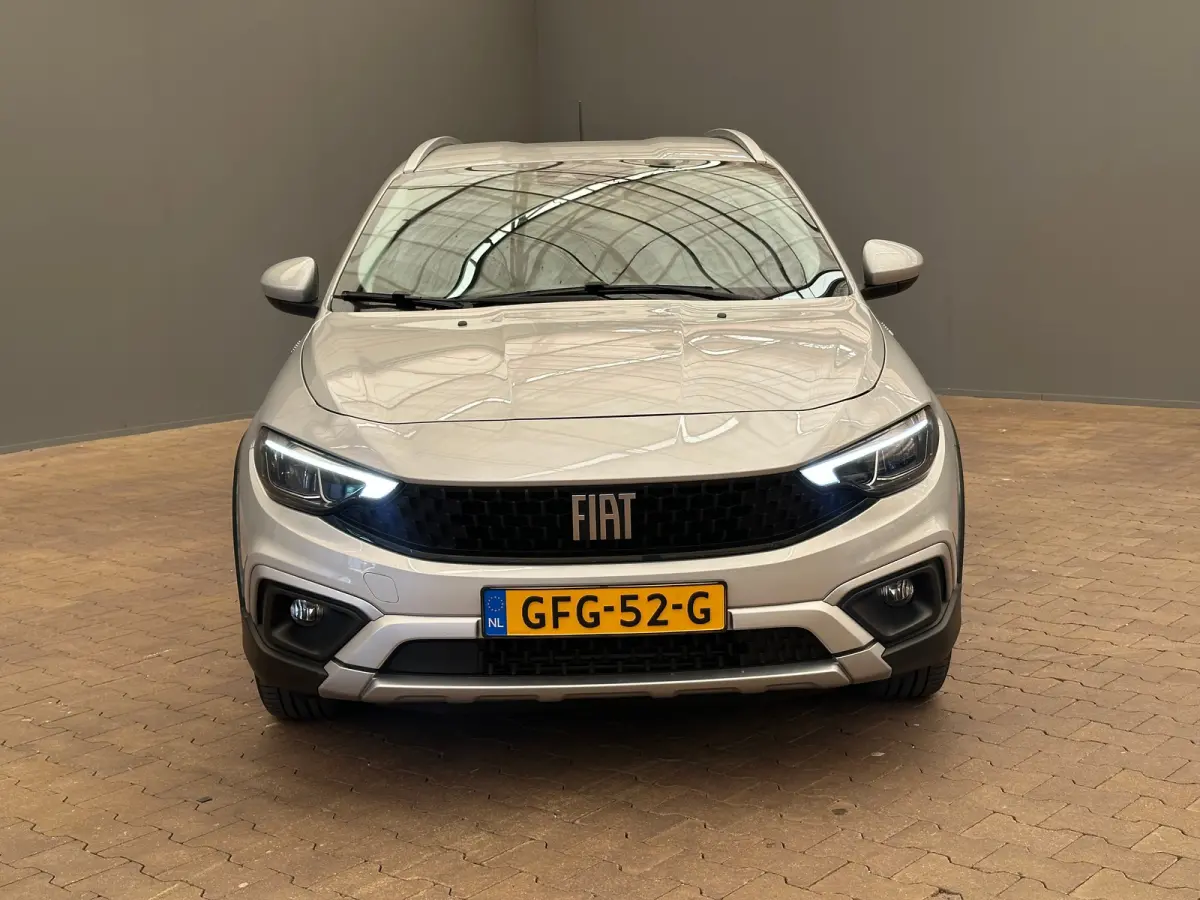 1.0 Cross Camera | Keyless | Navigatie | 17" Lichtmetaal | Climate | Adpatieve Cruise | Carplay | Achteruitrijcamera | Airco (automatisch) | Armsteun voor