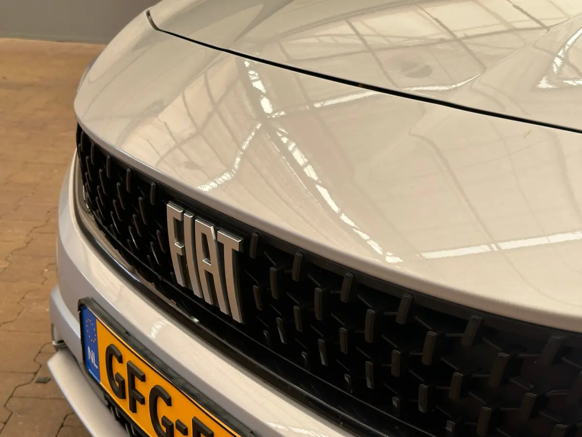 1.0 Cross Camera | Keyless | Navigatie | 17" Lichtmetaal | Climate | Adpatieve Cruise | Carplay | Achteruitrijcamera | Airco (automatisch) | Armsteun voor