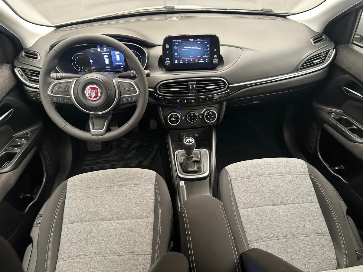 1.0 Cross Camera | Keyless | Navigatie | 17" Lichtmetaal | Climate | Adpatieve Cruise | Carplay | Achteruitrijcamera | Airco (automatisch) | Armsteun voor