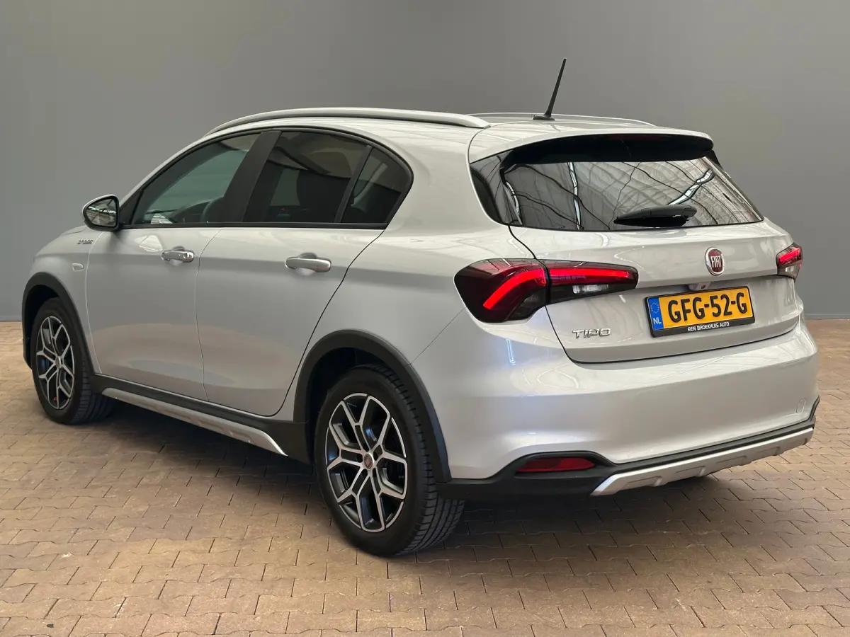 1.0 Cross Camera | Keyless | Navigatie | 17" Lichtmetaal | Climate | Adpatieve Cruise | Carplay | Achteruitrijcamera | Airco (automatisch) | Armsteun voor