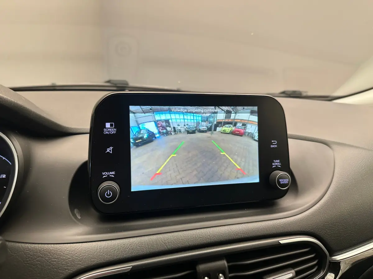 1.0 Cross Camera | Keyless | Navigatie | 17" Lichtmetaal | Climate | Adpatieve Cruise | Carplay | Achteruitrijcamera | Airco (automatisch) | Armsteun voor