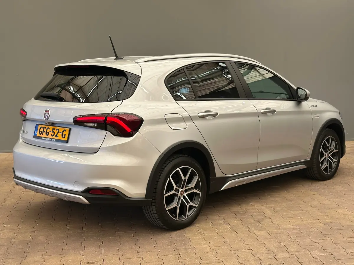 1.0 Cross Camera | Keyless | Navigatie | 17" Lichtmetaal | Climate | Adpatieve Cruise | Carplay | Achteruitrijcamera | Airco (automatisch) | Armsteun voor