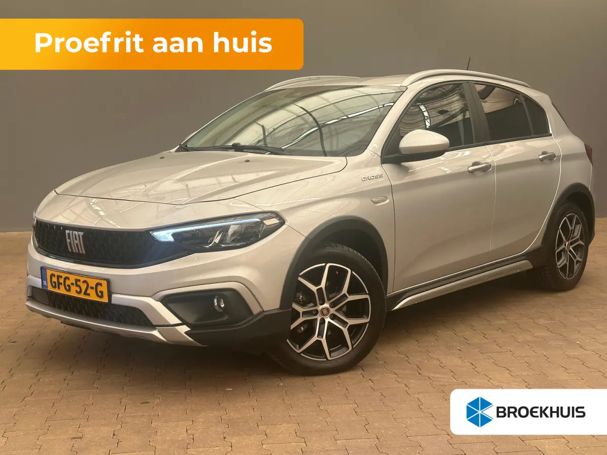 1.0 Cross Camera | Keyless | Navigatie | 17" Lichtmetaal | Climate | Adpatieve Cruise | Carplay | Achteruitrijcamera | Airco (automatisch) | Armsteun voor
