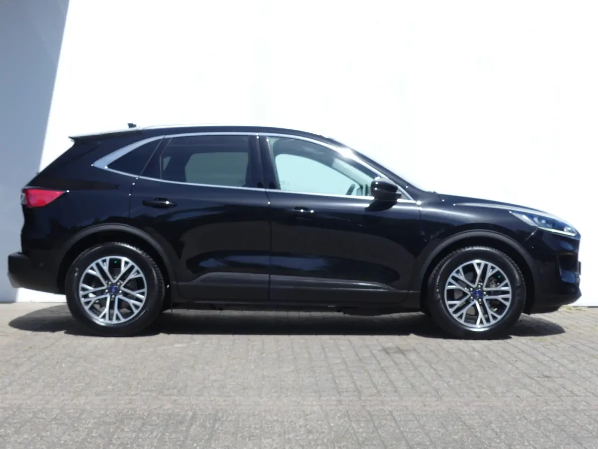 2.5 PHEV Titanium | CAMERA | ADAPTIVE CRUISE | DODEHOEKDETECTIE | STOEL+STUUR+VOORRUITVERWARMING | PARKEERSENSOREN V+A | ELEKTRISCHE ACHTERKLEP | LMV 18" | NAVI | APPLE CARPLAY / ANDRIOD AUT