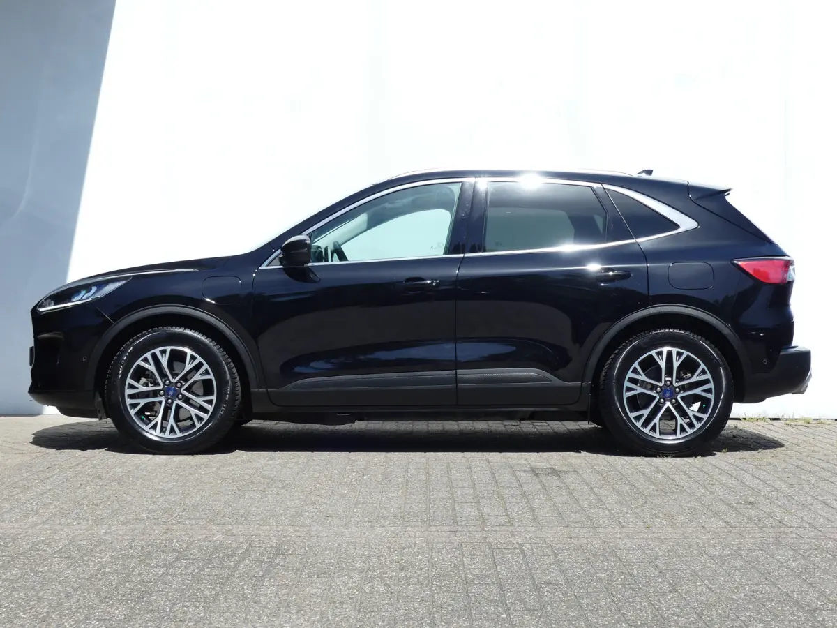 2.5 PHEV Titanium | CAMERA | ADAPTIVE CRUISE | DODEHOEKDETECTIE | STOEL+STUUR+VOORRUITVERWARMING | PARKEERSENSOREN V+A | ELEKTRISCHE ACHTERKLEP | LMV 18" | NAVI | APPLE CARPLAY / ANDRIOD AUT