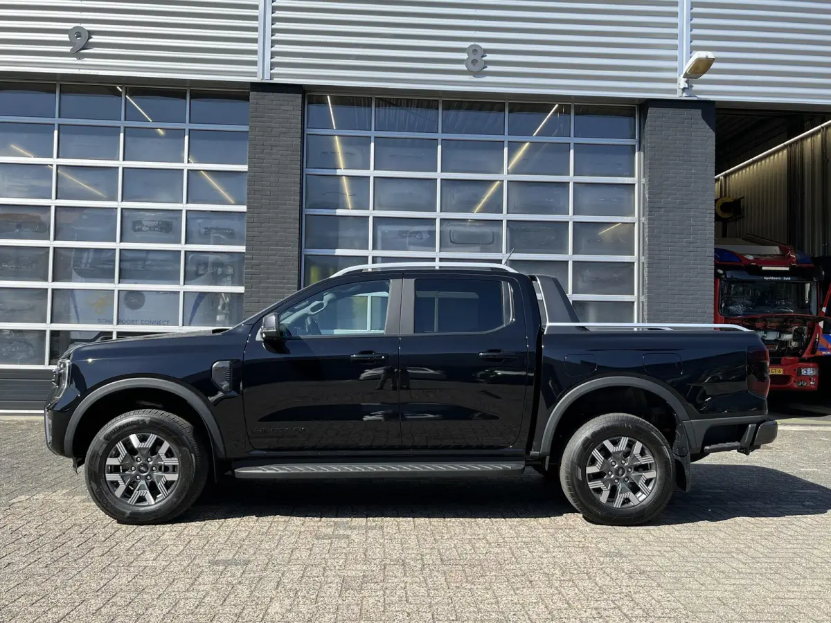 Wildtrak 2.3 PHEV 279pk! 5-pers, 3500kg Trekgewicht, Vol-Leer, Elek. rollertop, Adapt. Cruise control, Direct leverbaar, 0,99% Fin Lease!