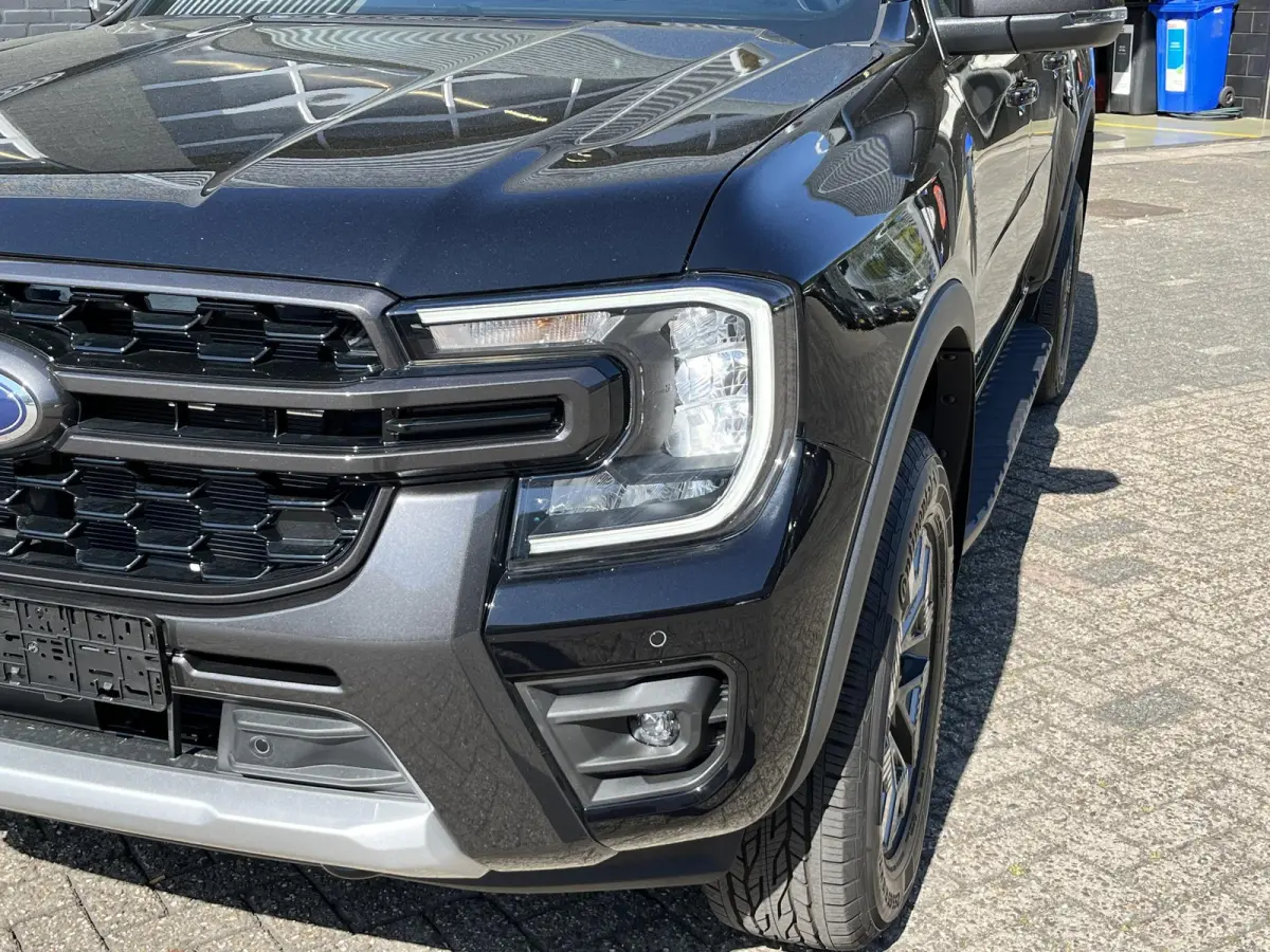 Wildtrak 2.3 PHEV 279pk! 5-pers, 3500kg Trekgewicht, Vol-Leer, Elek. rollertop, Adapt. Cruise control, Direct leverbaar, 0,99% Fin Lease!