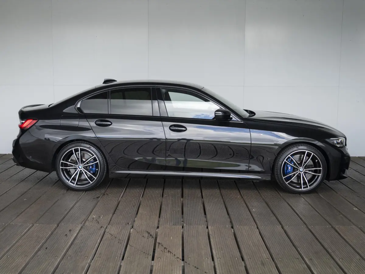 M340i xDrive | Innovationspakket | Comfort Access | Head-Up Display | Achteruitrijcamera | Stoelverwarming | PDC | Laserlight | 19 inch