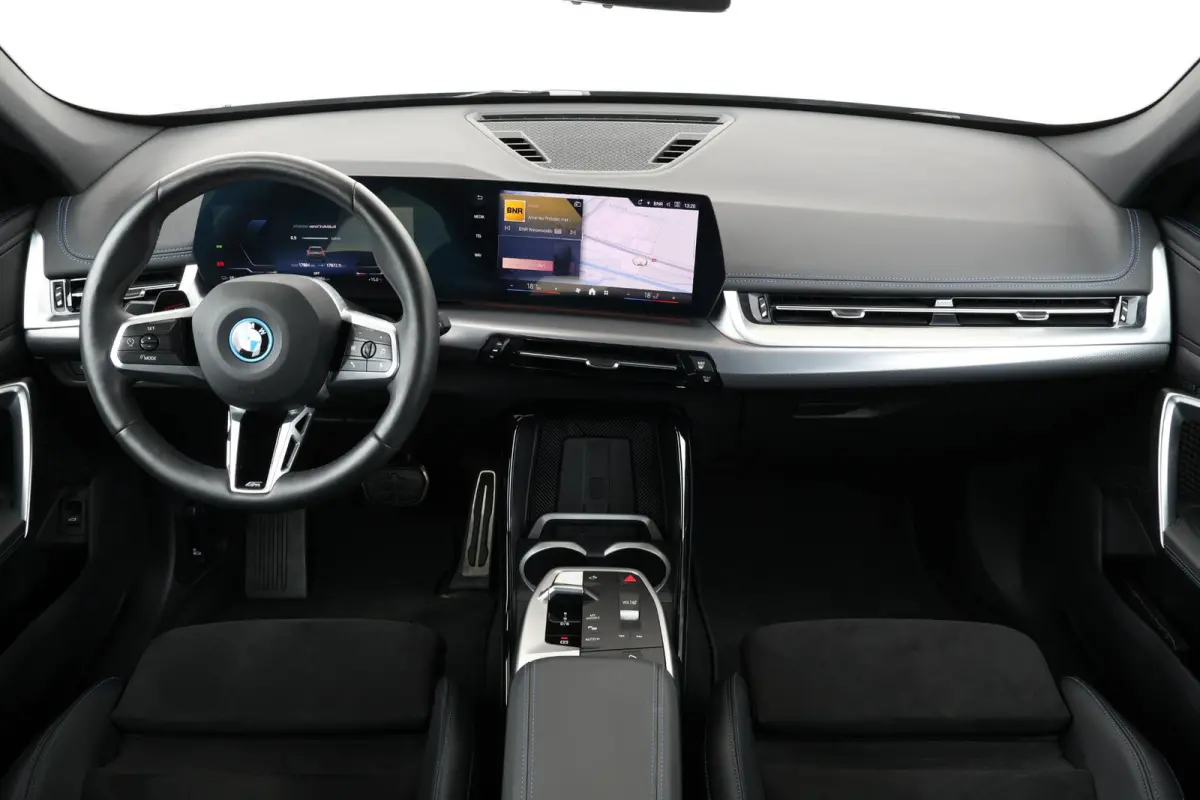 eDrive20 67 kWh M Sport Edition | SoH 100% | Sportpakket Pro | 19'' LM | Stoelverwarming Voor | Achteruitrijcamera |