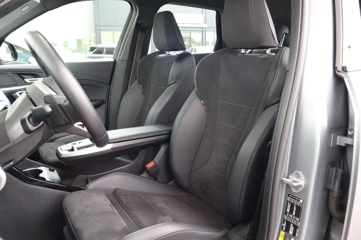 eDrive20 67 kWh M Sport Edition | SoH 100% | Sportpakket Pro | 19'' LM | Stoelverwarming Voor | Achteruitrijcamera |