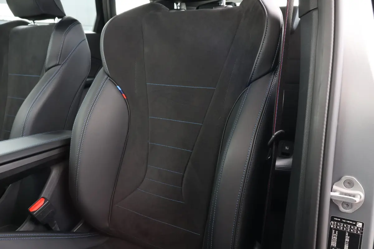 eDrive20 67 kWh M Sport Edition | SoH 100% | Sportpakket Pro | 19'' LM | Stoelverwarming Voor | Achteruitrijcamera |