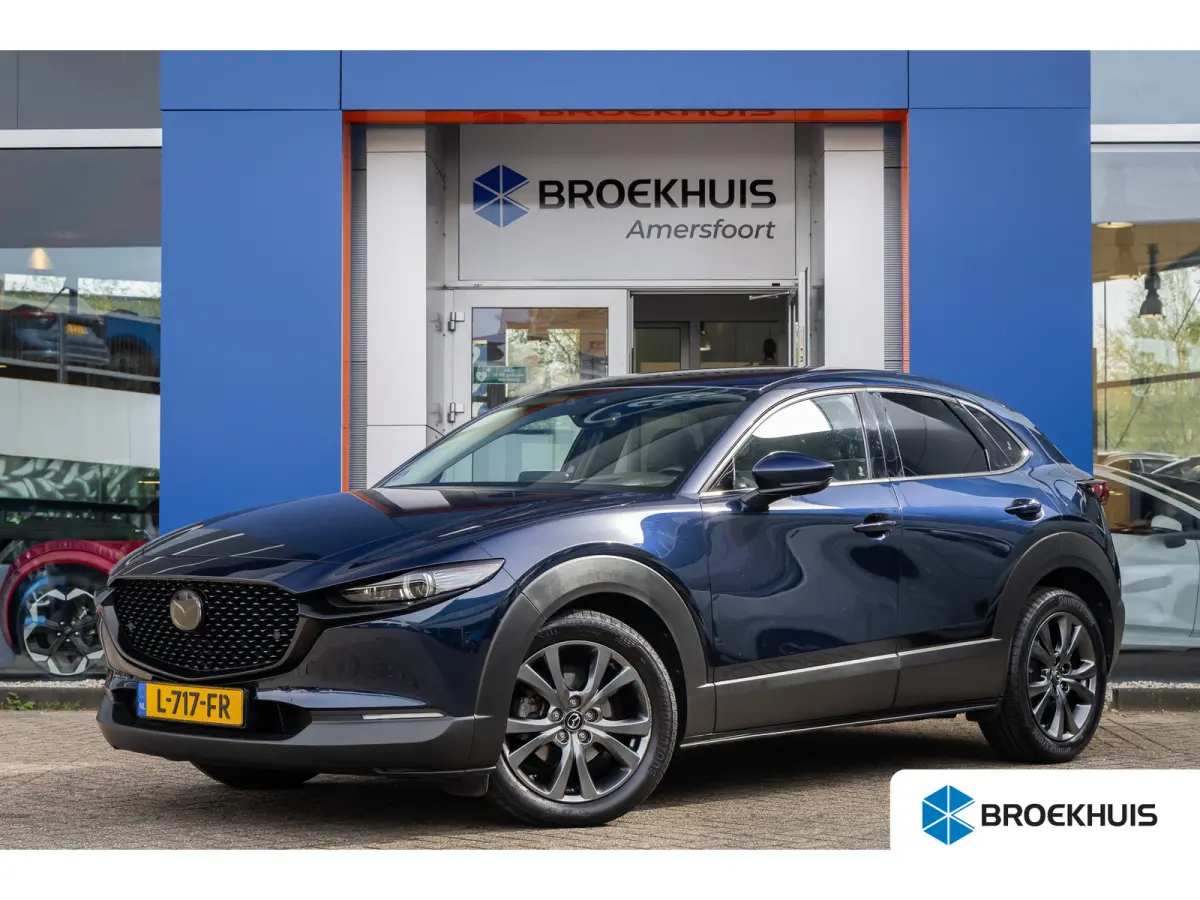 2.0 e-SkyActiv-X M Hybrid Luxury | Head-Up display | BOSE | Camera | Stoel/Stuurverwarming | Leder | Apple Carplay/Android Auto | 18''LM Velgen | Achteruitrijcamera | Apple Carplay/Android A