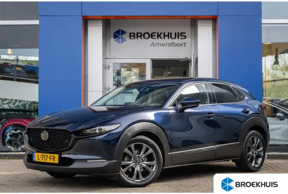 2.0 e-SkyActiv-X M Hybrid Luxury | Head-Up display | BOSE | Camera | Stoel/Stuurverwarming | Leder | Apple Carplay/Android Auto | 18''LM Velgen | Achteruitrijcamera | Apple Carplay/Android A