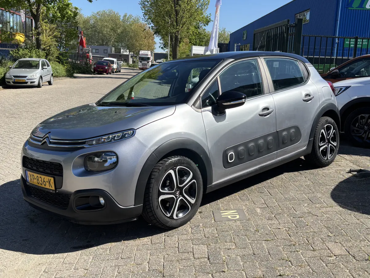 1.2 PureTech Feel GARANTIE/CARPLAY/CLIMA/CRUISE/NAVI/PARKEERSENS./TREKHAAK rijklaarprijs!