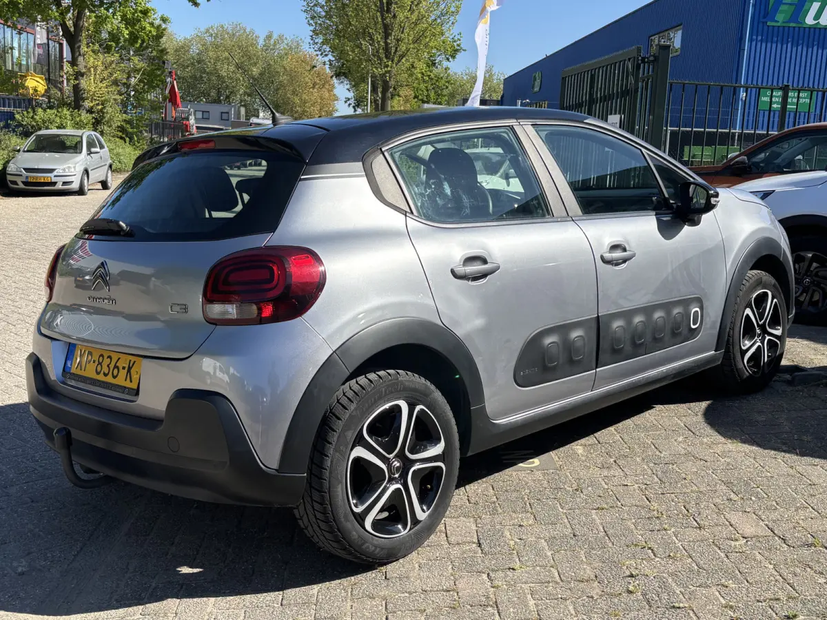 1.2 PureTech Feel GARANTIE/CARPLAY/CLIMA/CRUISE/NAVI/PARKEERSENS./TREKHAAK rijklaarprijs!
