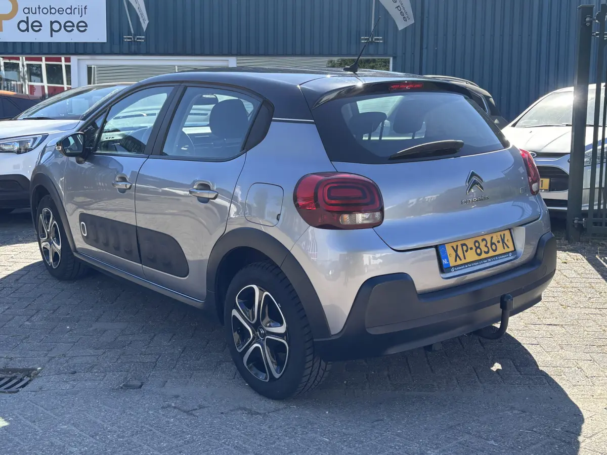 1.2 PureTech Feel GARANTIE/CARPLAY/CLIMA/CRUISE/NAVI/PARKEERSENS./TREKHAAK rijklaarprijs!