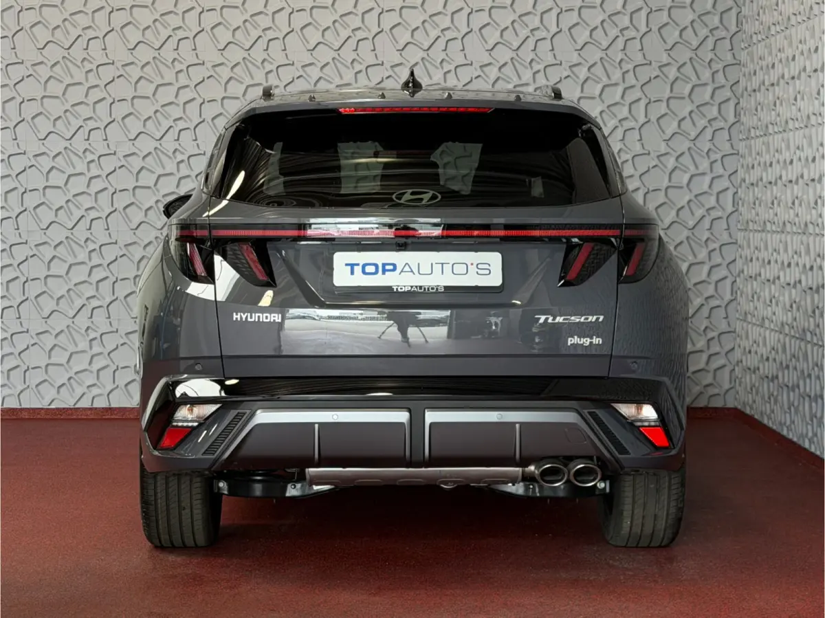 ONGEBRUIKTE AUTO 1.6 T-GDI PHEV N-LINE CAMERA ELEK.KLEP ELEK.STOEL/GEHEUG.VERW/GEKOELD SUBWFR 19''LMV ZWARTE HEMEL STUURVERW. PLUG IN HYBRIDE