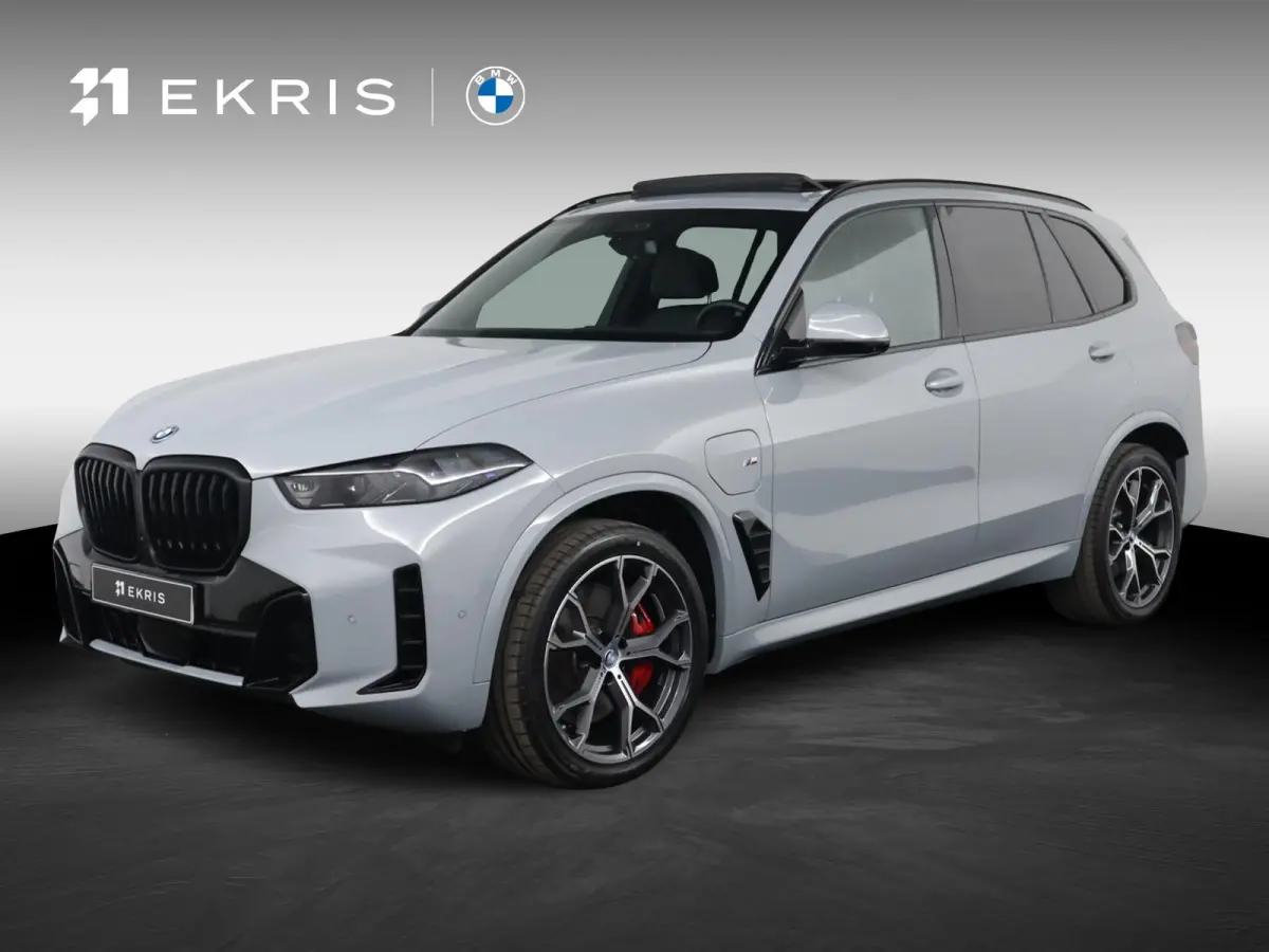 xDrive50e | SOH 100% | M Sport Pro | Skylounge Panoramadak | Driving Assistant Professional | Soft-Close | Achterasbesturing | Comfortstoelen |
