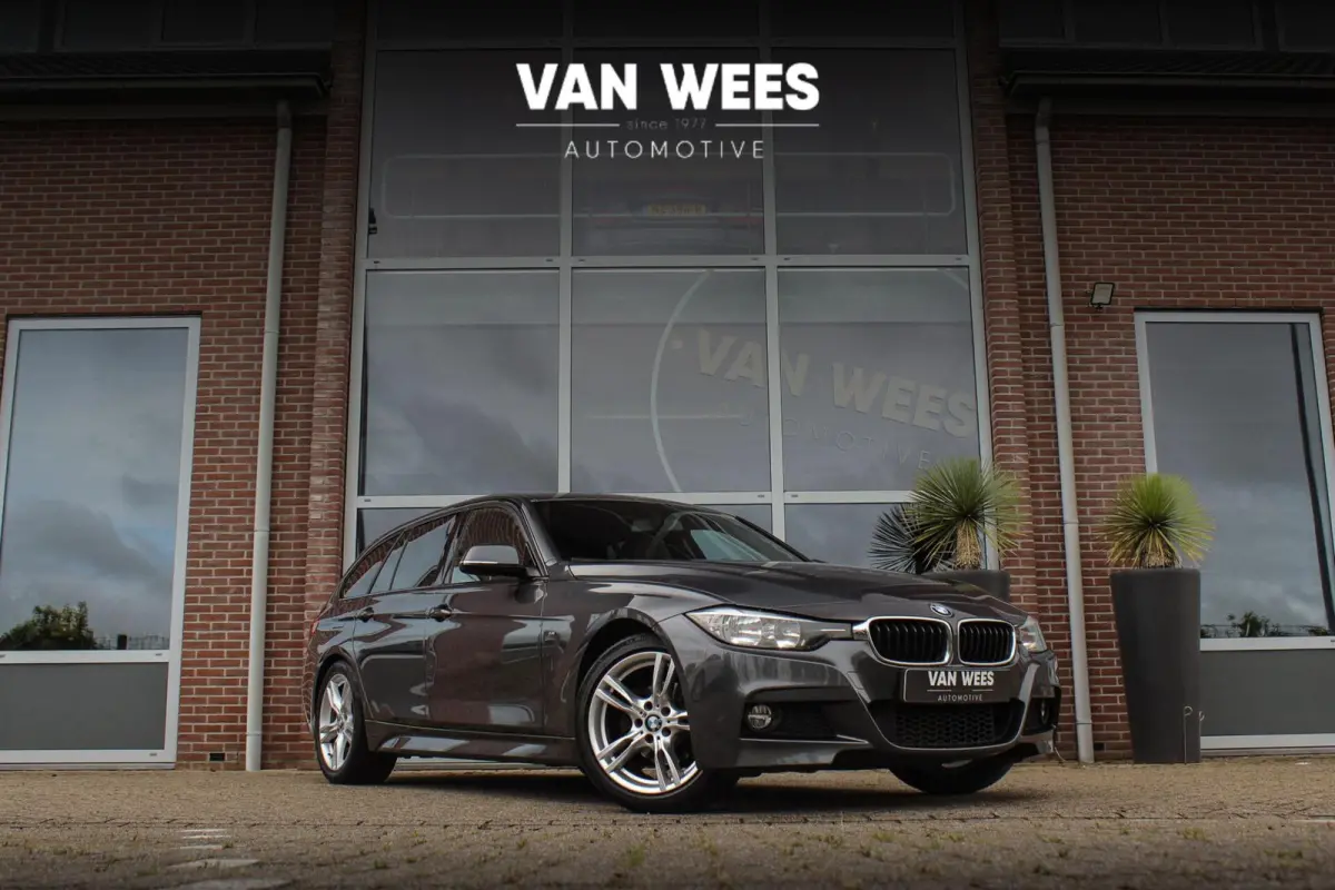 318i Centennial Executive M-sport | 2e eigenaar | HiFi audio | Navigatie | Bluetooth | Climate control | M-sportstuur | Cruise control | PDC | 18 inch | Trekhaak