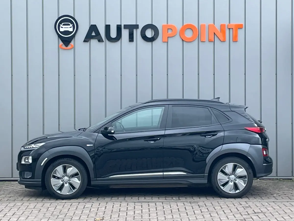 EV Premium 64 kWh SOH100%|1E EIG DEALEROND|STOEL.VRM+VERKOELING|LEER|KEYLESSGO|HEADUP|STUUR.VRM|LANE ASS|ADAPT.CRUISE