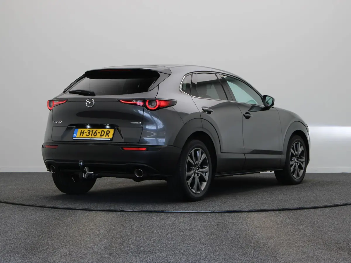 2.0 e-SkyActiv-X M Hybrid Luxury | Trekhaak | Head-up display | elektrische verstelbare stoelen | Stoel-stuurverwarming