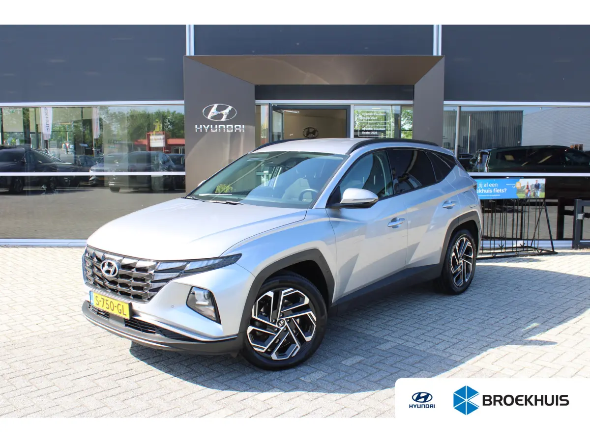 1.6 T-GDI PHEV Comfort Smart 4WD | Trekhaak | | Achteruitrijcamera | Airco (automatisch) | Apple Carplay/Android Auto|telefoonintegratie premium