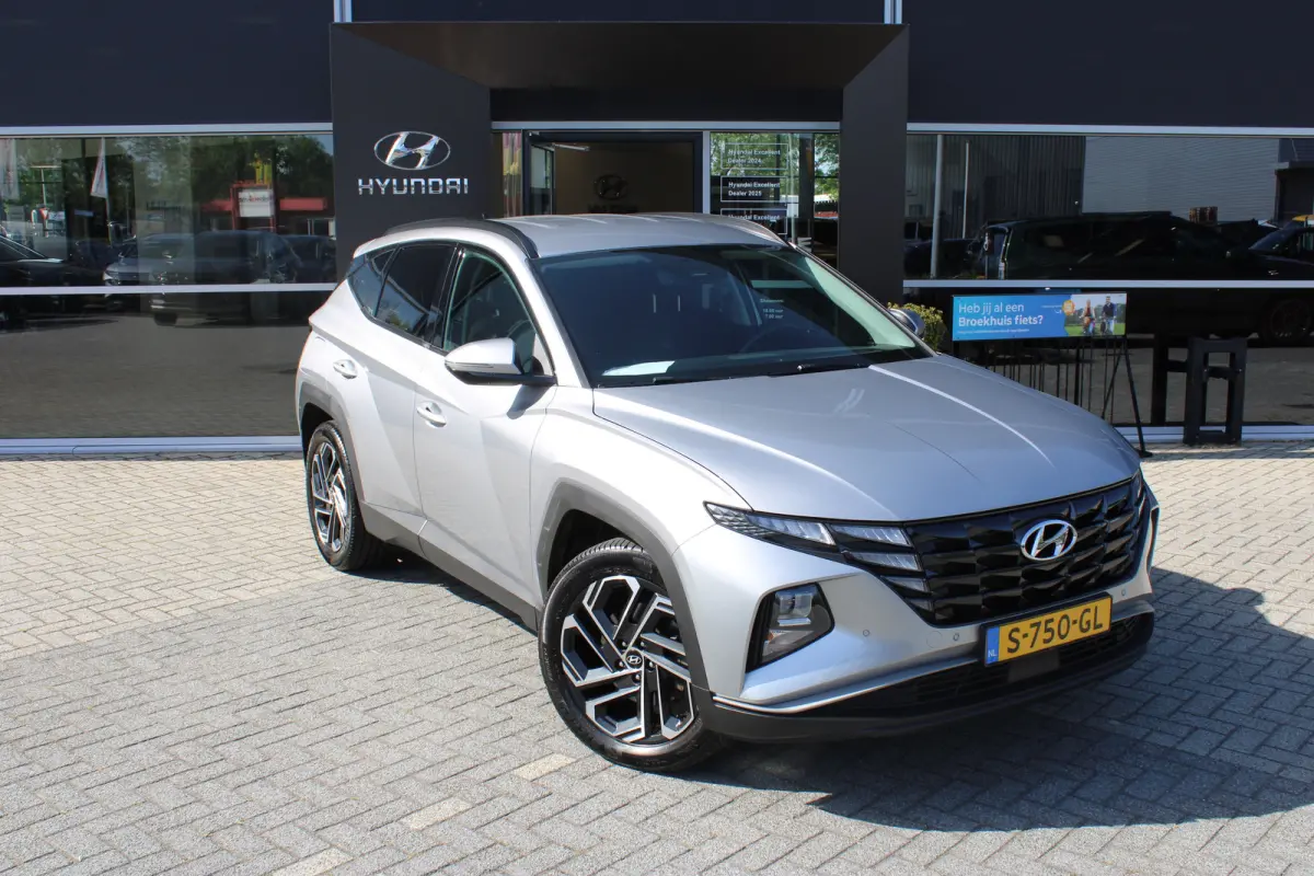 1.6 T-GDI PHEV Comfort Smart 4WD | Trekhaak | | Achteruitrijcamera | Airco (automatisch) | Apple Carplay/Android Auto|telefoonintegratie premium