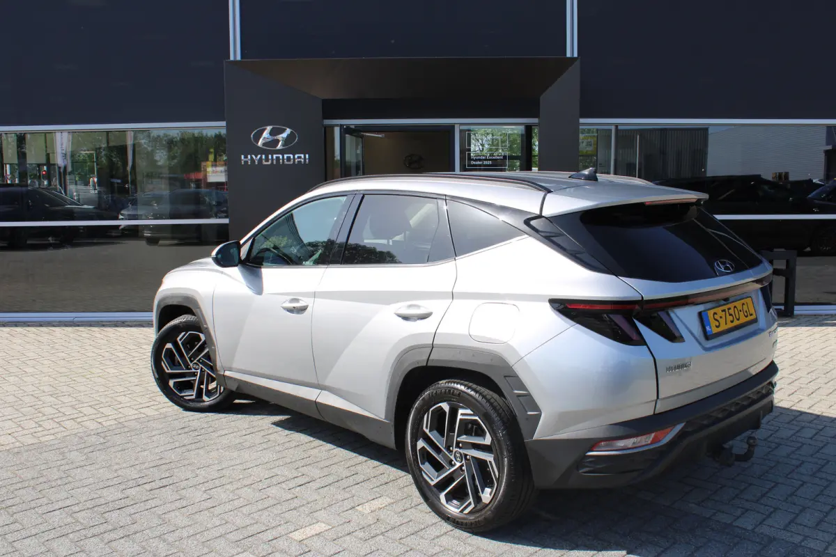 1.6 T-GDI PHEV Comfort Smart 4WD | Trekhaak | | Achteruitrijcamera | Airco (automatisch) | Apple Carplay/Android Auto|telefoonintegratie premium