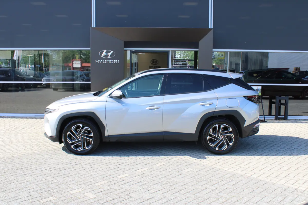 1.6 T-GDI PHEV Comfort Smart 4WD | Trekhaak | | Achteruitrijcamera | Airco (automatisch) | Apple Carplay/Android Auto|telefoonintegratie premium