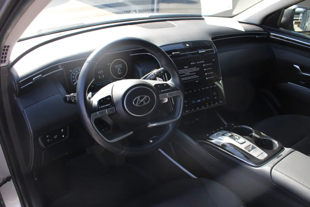 1.6 T-GDI PHEV Comfort Smart 4WD | Trekhaak | | Achteruitrijcamera | Airco (automatisch) | Apple Carplay/Android Auto|telefoonintegratie premium