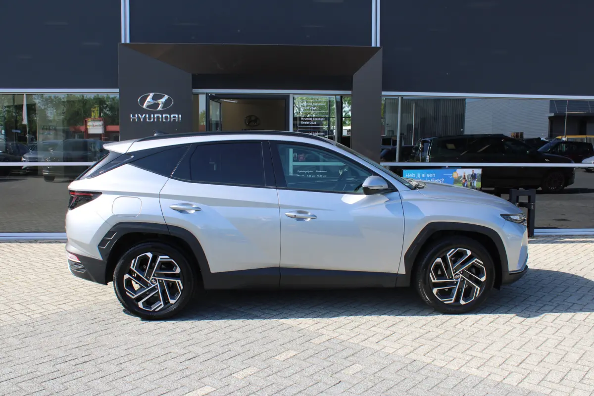 1.6 T-GDI PHEV Comfort Smart 4WD | Trekhaak | | Achteruitrijcamera | Airco (automatisch) | Apple Carplay/Android Auto|telefoonintegratie premium