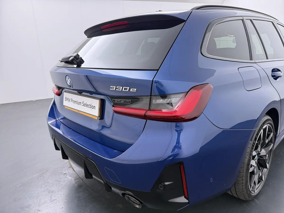 330e | SoH 100% | Individual Le Mans Blue | M Sportpakket Pro | Head-Up | Adaptive Cruise | Trekhaak | Panoramadak | Comfort Access | Stoel & Stuurverwarming