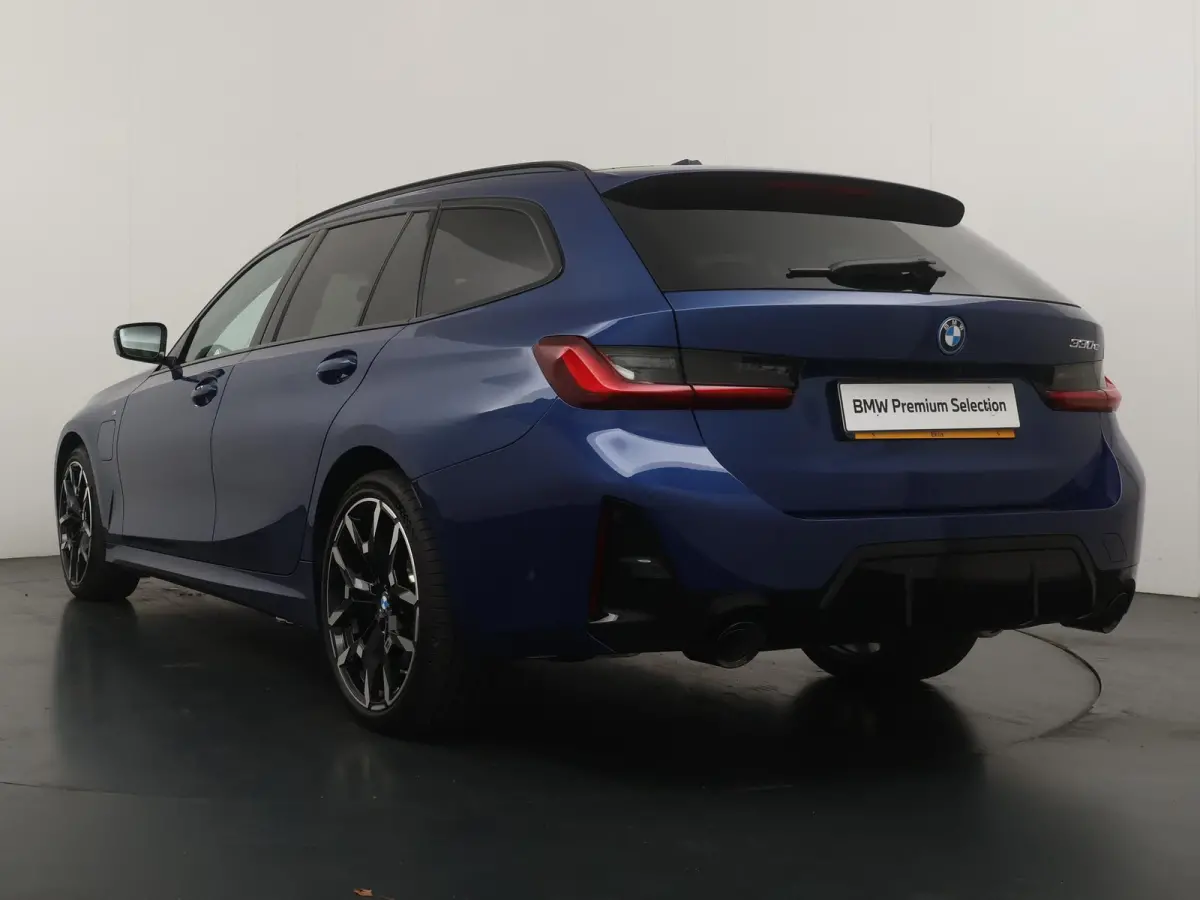 330e | SoH 100% | Individual Le Mans Blue | M Sportpakket Pro | Head-Up | Adaptive Cruise | Trekhaak | Panoramadak | Comfort Access | Stoel & Stuurverwarming