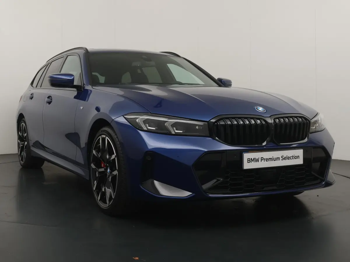 330e | SoH 100% | Individual Le Mans Blue | M Sportpakket Pro | Head-Up | Adaptive Cruise | Trekhaak | Panoramadak | Comfort Access | Stoel & Stuurverwarming