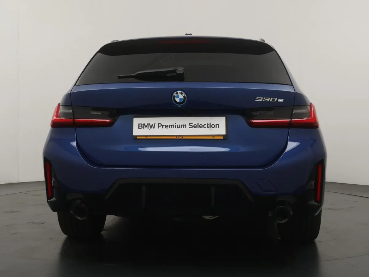 330e | SoH 100% | Individual Le Mans Blue | M Sportpakket Pro | Head-Up | Adaptive Cruise | Trekhaak | Panoramadak | Comfort Access | Stoel & Stuurverwarming