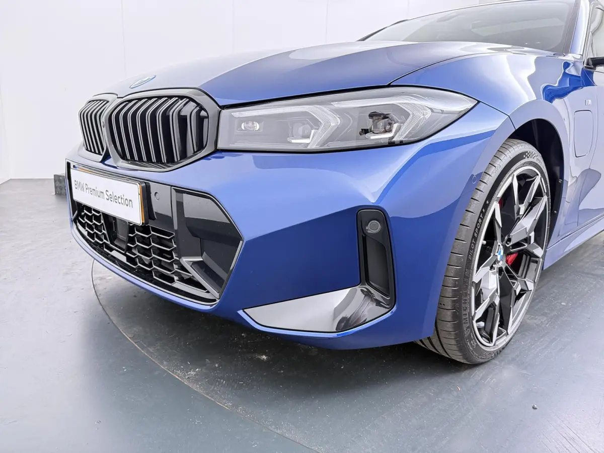 330e | SoH 100% | Individual Le Mans Blue | M Sportpakket Pro | Head-Up | Adaptive Cruise | Trekhaak | Panoramadak | Comfort Access | Stoel & Stuurverwarming